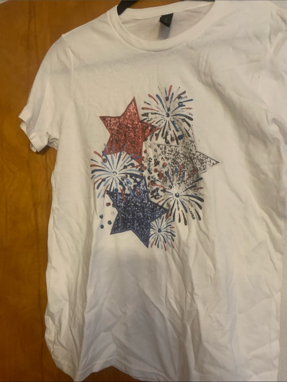 Cream color tee shirt. Spare room